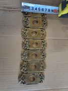 Mosiężne szyldy do klamek okiennych