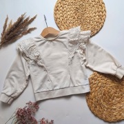 Bluza z falbankami 98 koronkowymi falbanki beżowa ecru elegancka  koronka