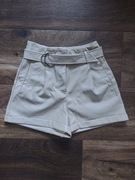 Beżowe szorty z eko skóry z paskiem Amisu, rozmiar 34, XS