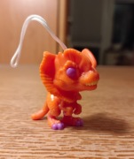 Kinder Joy Jurrasic World dinozaur pomarańczowy figurka