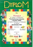 Dyplom "Pocztówkowego Łańcucha z klocków LEGO" Kraków 1999 AUTOGRAF