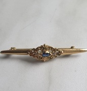 Broszka zdobiona kamieniami