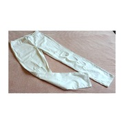 Białe spodnie materiałowe z dziurami przetarciami r. 42 