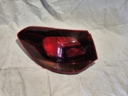Lampa tylna Lewa Opel Astra J 09-15 Kombi Dymiona ciemna 13314052