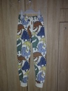 Spodnie dresowe w dinozaury H&M r. 128