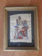 Papirus egipski w złotej ramce