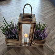 Lampiony z doniczkami po boku