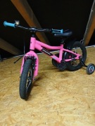 Dziecięcy rowerek dla dziewczynki rower różowy z bocznymi kołkami