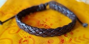 Pleciona bransoletka ze sztucznej skóry 