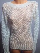 Sweter robiony na drutach