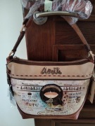 Nowa torebka Menire Cross-body z brelokiem 