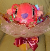 Bukiet wieczne roze że wstążki satynowej 