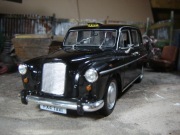 Austin FX4 London Taxi Welly bez pudła 1:24