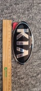 Emblemat Znaczek Logo KIA PRZÓD TYŁ OE 86320-1W250 NOWY! 13x6,5 cm ORYGINAŁ
