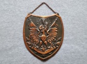 Ryngraf mosiężny z Matką Boską, orzeł w koronie.