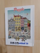 Puzzle Unicef stan w środku jak nowe
