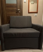 Fotel z funkcją łóżka rozkładanego z pojemnikiem na pościel 