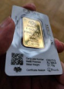 sztabka złota blister imitacja 1 uncja PAMP certyfikat z indywid. numerem