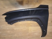 BŁOTNIK TUCSON IV LEWY PRZÓD YG7