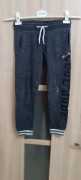 Chłopięce spodnie dresowe typu jogger 128 cm