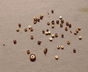 Części zegarmistrzowskie,  tulejki z mosiądza