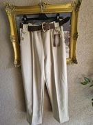 Spodnie damskie beżowe/jasne fango typ masełko z paskiem złote guziki