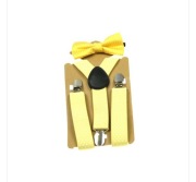 Dziecięce żółte szelki z muszką w kropki