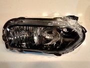 Fabrycznie nowy prawy reflektor Dacia Spring. Światła mijania i drogowe.