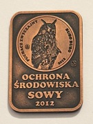 Sowy. Miedziana klipa. Gyges