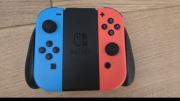 Zestaw 2 oryginalnych kontrolerów Joy-Con Nintendo Switch + grip