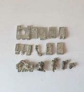 Różne elementy i figurki, metale, złom.