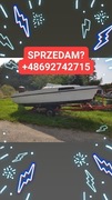 Łódź kabinowa z silnikiem i przyczepka 