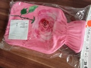 Termofor w ozdobnym pokrowcu