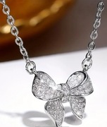 Naszyjnik z kokardą kokardką stal i cyrkoniami cubic zirconia+ pudełko