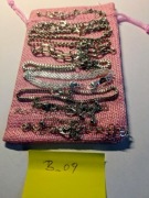 Zestaw 11 bransoletek posrebrzanych w gustownym woreczku. B_09