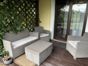 Meble ogrodowe - sofa, dwa fotele, stolik