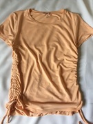 Orsay. Słodka, delikatna w kolorze i dotyku z wiązaniami po bokach