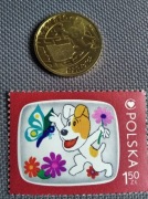 Znaczek i moneta Reksio 