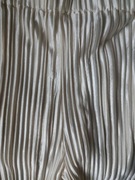 Eleganckie plisowane spodnie satynowe dla dziewczynki 2-3 lata kremowe