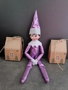 Psotny Elf on the shelf elf badly behaving