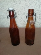 Dwie butelki szklane z okresu PRL od lemoniady. 