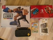 Nintendo Switch + gry + etui + karta SD + skin