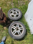 Felgi z oponami wielosezonowe 185/60R15 ford focus