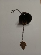 Dzwonek żeliwny, metalowe dodatki długość całkowita 33 cm 