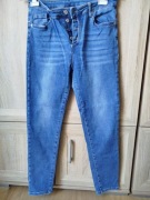 Niebieskie damskie jeansy typu jegging L