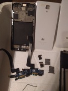 Widoczne na zdjęciach części do Xiaomi Mi 4 LTE, 12 elementów