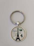 Brelok , breloczek , wypukłe szkło..