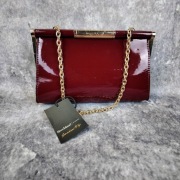 River Island bordowa torebka kopertówka lakierowana złota