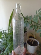 Stara butelka z podziałką 