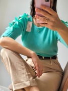 Miętowy sweter damski na krótki rękaw z kokardkami na wiosnę ciepły miły